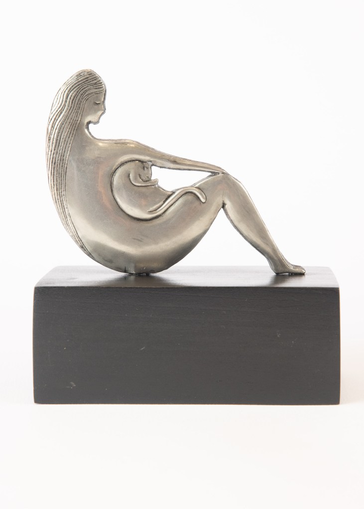 Cuddles with cat. Embossed pewter art work 110 x 110 by Sandy Griffiths.