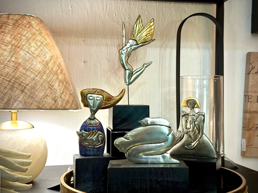 A display of Sandy Griffiths embossed pewter statues at Beeswood Decor | Gifts on the Franchhoek road.