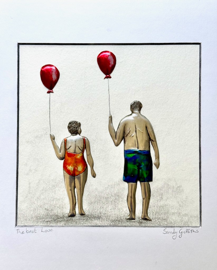 Embossed pewter artwork showing an old man and an old woman, wearing swimming costumes holding red balloons.